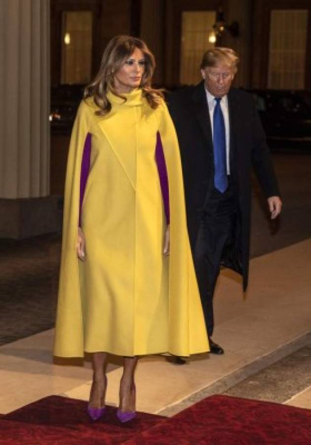 U.S. President Donald Trump with his wife Melania arrive for the formal reception for the heads of the NATO countries, at Buckingham palace in London Tuesday Dec. 3, 2019. Leaders from across the 29-member trans-Atlantic alliance are gathered in London to mark the 70th anniversary of NATO. (Richard Pohle/Pool via AP)