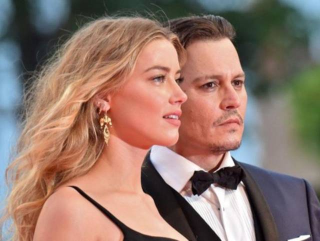 Amber Heard planea escribir libro sobre su historia con Johnny Depp para poder pagarle la indemnización
