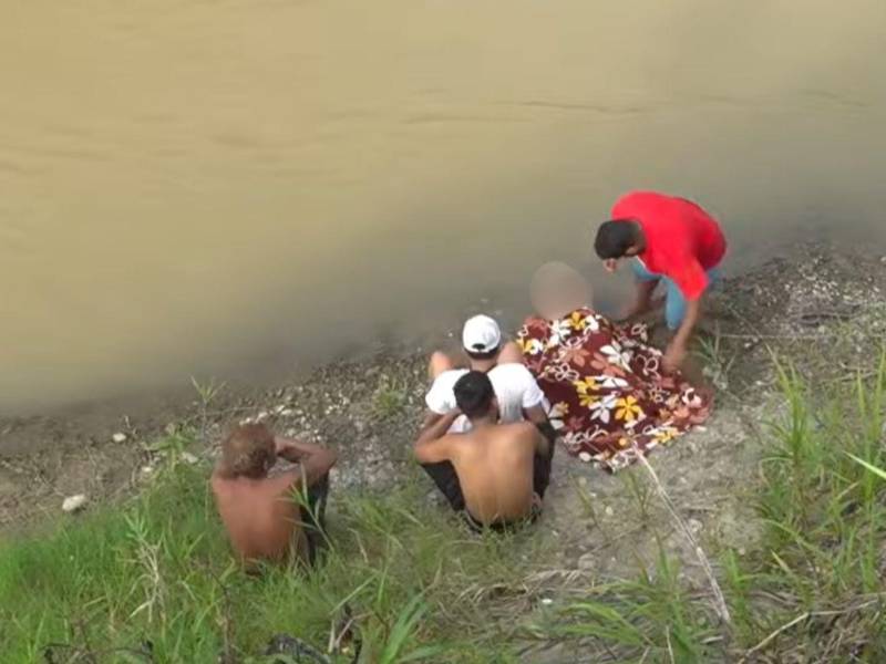 Familiares y rescatistas participaron en la búsqueda de José Carlos Cruz, de 15 años, localizado sin vida en el río Chamelecón.