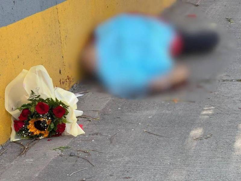 Escena donde quedó el cuerpo sin vida de Winiker Elena Galeas Alvarado.