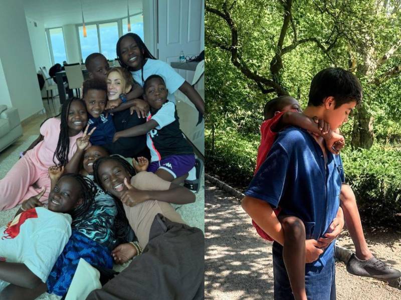 La cantante feliz con los chicos del grupo. Y en la imagen de la derecha, una amorosa escena de su hijo Milan cargando a uno de los niños de Ghetto Kids.
