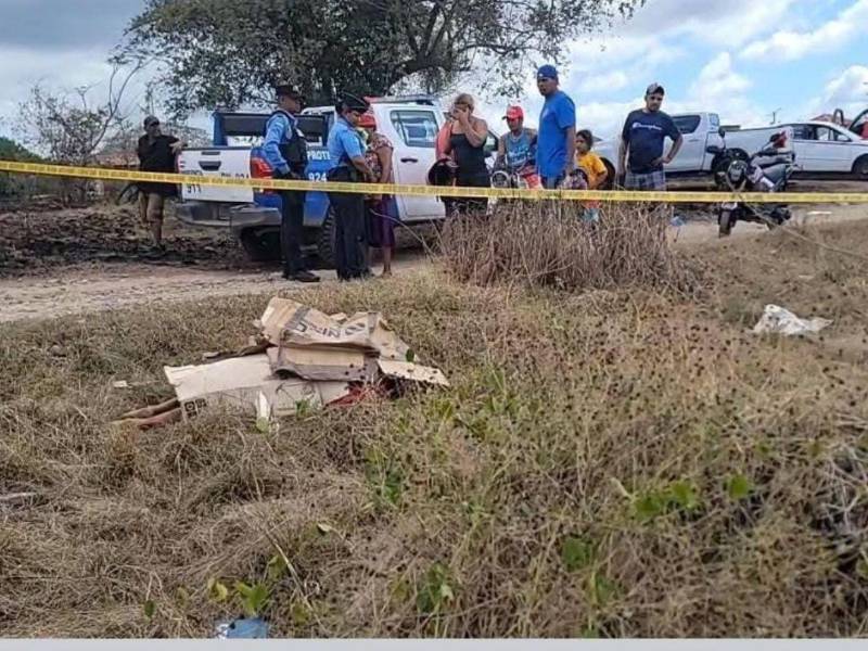 El cuerpo de la fémina quedó tendido en una calle cercana a un cementerio local.