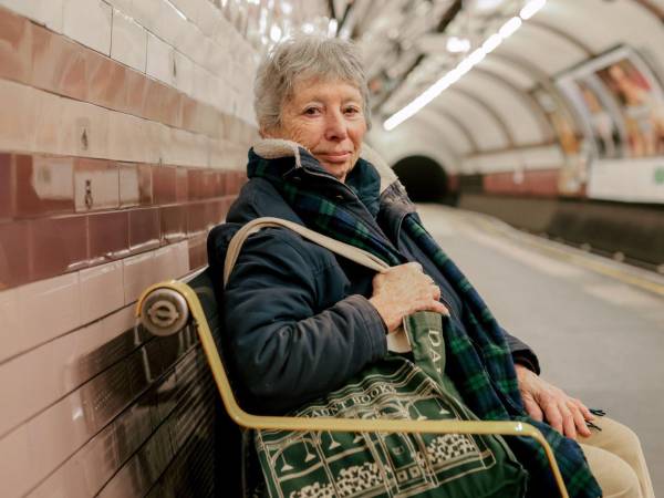 Judith Chernaik, who Forty years ago had the idea to put poems in the Underground, LondonÕs subway system, at Columbia Road Underground Station on Feb. 12, 2026. ChernaikÕs idea to feature verse in subway cars has transformed the morning commutes of millions worldwide. (Sam Bush/The New York Times)