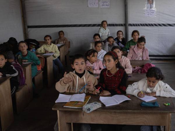 Students at an Academy of Hope school in Khan Younis, Gaza Strip, on Feb. 8, 2026. Quietly, and despite considerable risk, a network of free private schools for war orphans and other children has sprouted in the Gaza Strip, as the brainchild of a Palestinian American neurosurgeon, Dr. David Hasan. (Saher Alghorra/The New York Times)