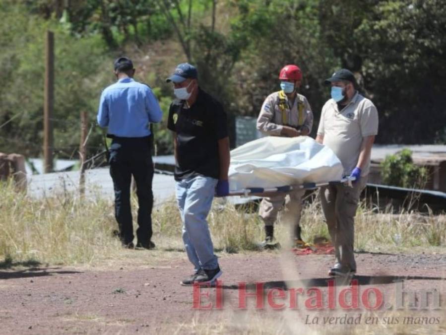 Las dramáticas imágenes del hallazgo del cadáver de un taxista raptado en la capital (FOTOS)