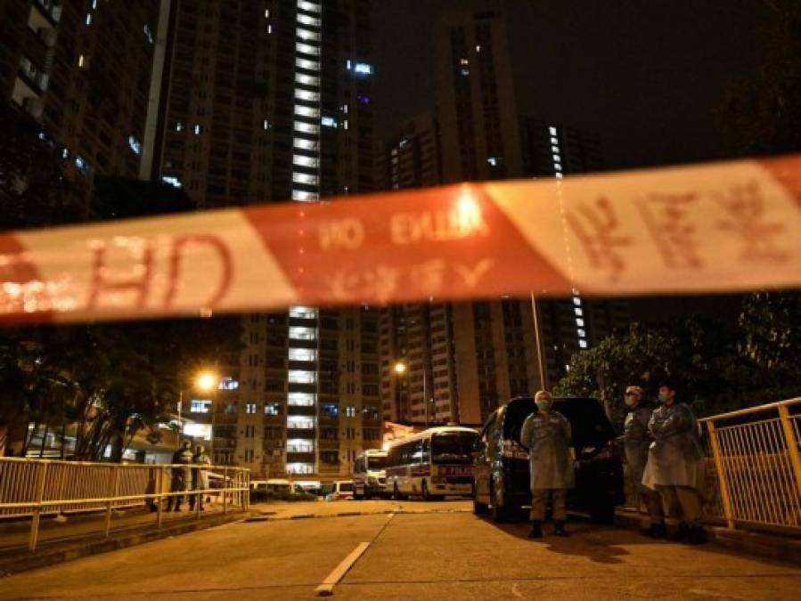 FOTOS: Rigurosa inspección en Hong Kong tras infección en cena familiar