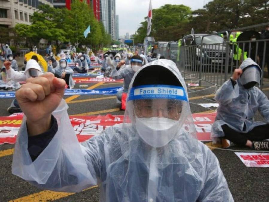 Con protestas y detenidos, así celebró el mundo el Día del Trabajador (FOTOS)