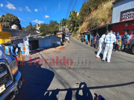 FOTOS: Luto y llanto en escena de masacre en la Villa Nueva