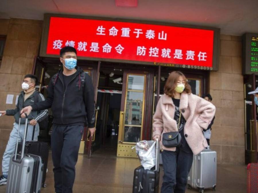 FOTOS: China empieza a retirar restricciones en centro de epidemia 