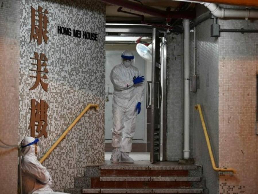 FOTOS: Rigurosa inspección en Hong Kong tras infección en cena familiar