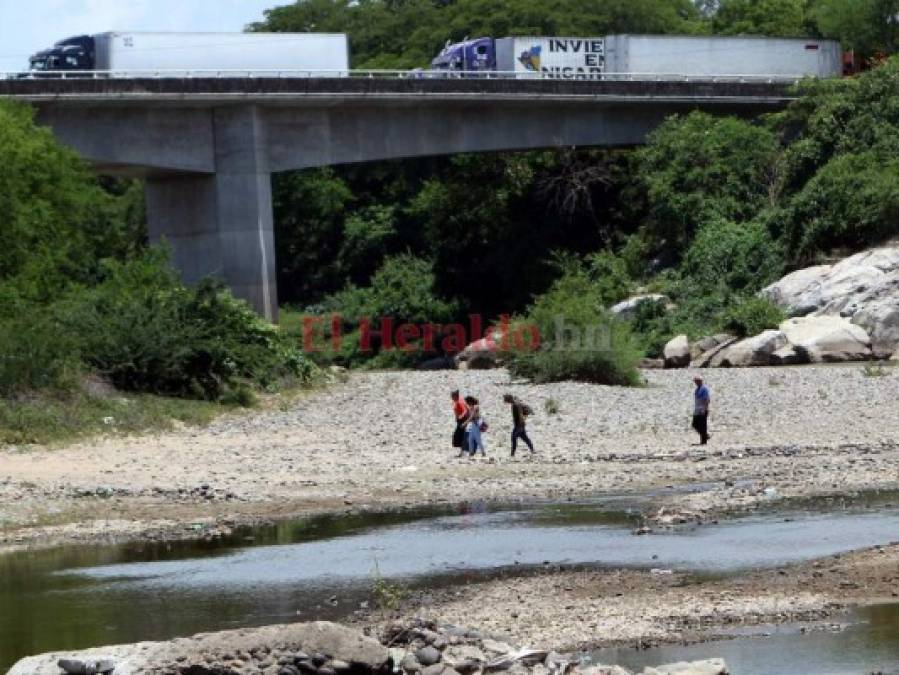 FOTOS: De huir de la convulsión en Haití a caer en el infierno en Honduras