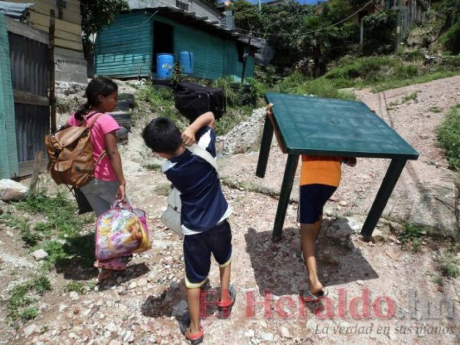 Entre sonrisas, trabajo y miradas de incertidumbre, niñez hondureña celebra su día