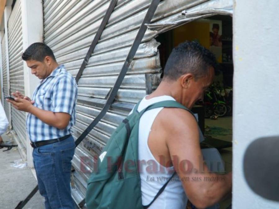 FOTOS: Así capturaron a mujer que quedó encerrada en negocio durante saqueos en San Pedro Sula