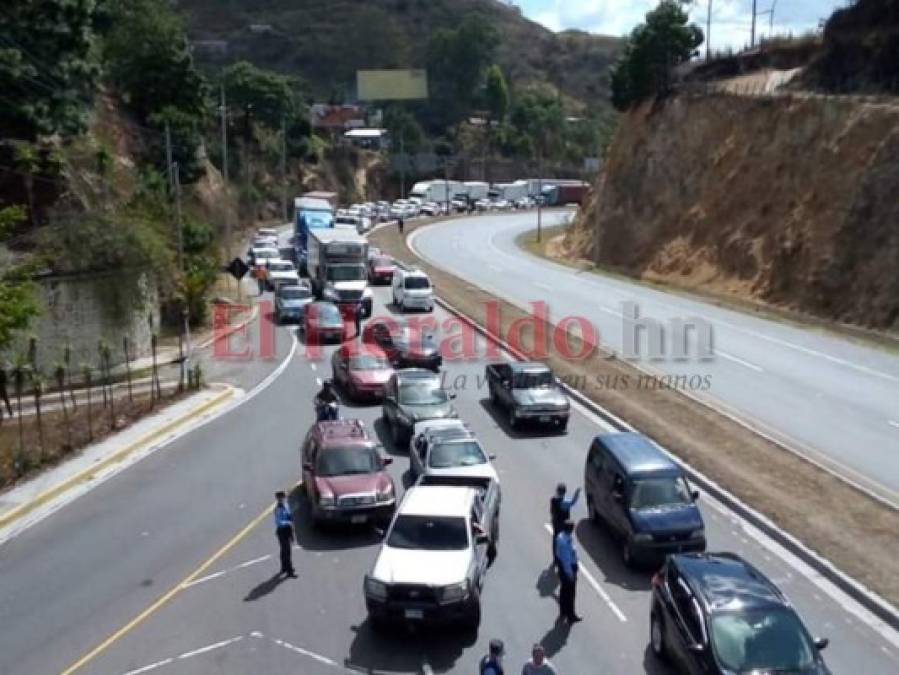 Largas colas por cierre de entradas a la capital en cuarentena por Covid-19