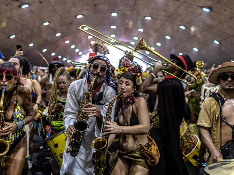 HEADLINE: RioÕs Rolling Carnival CAPTION: Musicians perform in the crowd during the Boi Tolo in Rio de Janeiro, Feb. 15, 2026. The Boi Tolo, one of the cityÕs most iconic street parties, has come to represent the glittery, gritty grass-roots celebration far from the glamour of the official parades.