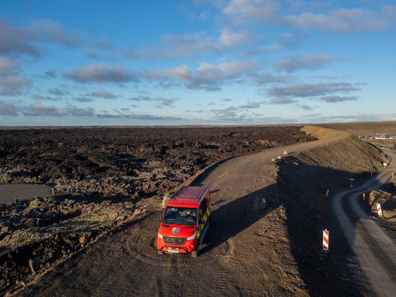 Helgi Hjorleifsson drives over new barriers built to block lava outside Rejkyavik, Iceland, Feb. 13, 2026. Hjorleifsson, a firefighter, is a leader in a national experiment to steer rivers of lava away from important sites. Some called it crazy, but it worked.