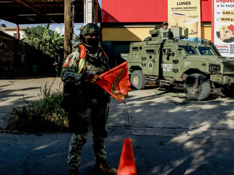 FILE — Mexican army soldiers at a checkpoint outside a convenience store in Culiacán, Mexico, Sept. 29, 2025. On Sunday, Feb. 22, 2026, the long hunt for Nemesio Oseguera Cervantes — the elusive kingpin known as “El Mencho” — came to a violent end, leaving a leadership vacuum in the Jalisco New Generation Cartel and the possibility that another criminal group will try to take its place. (Adriana Zehbrauskas/The New York Times)