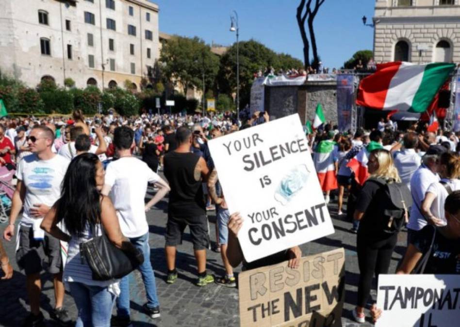 Conozca las teorías falsas detrás de los antimascarillas (FOTOS)  