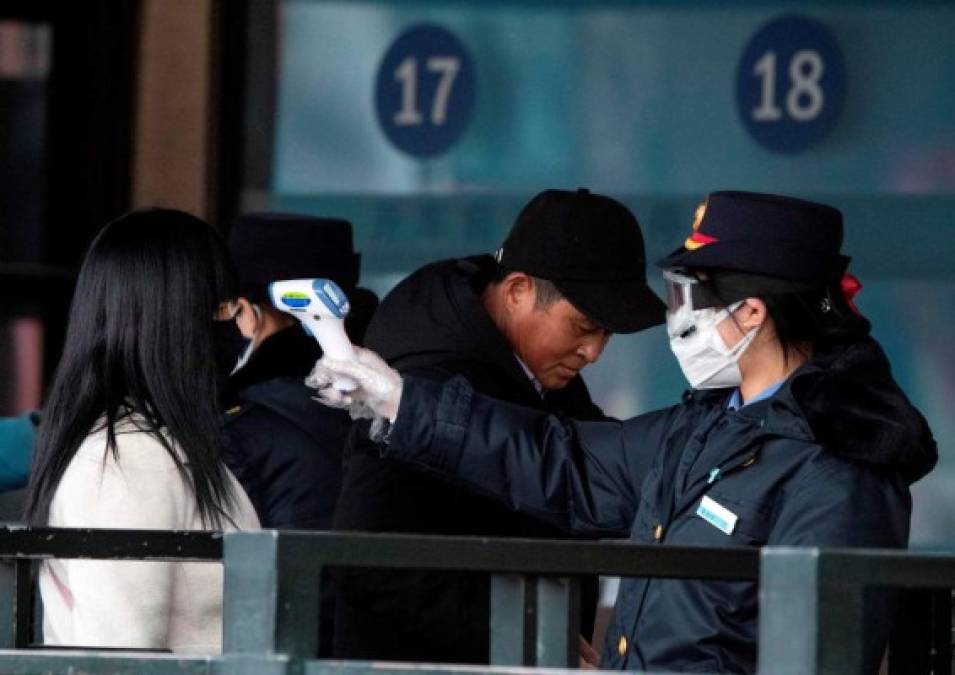 FOTOS: Crece el pánico en China ante brote de coronavirus; ya son 304 los muertos
