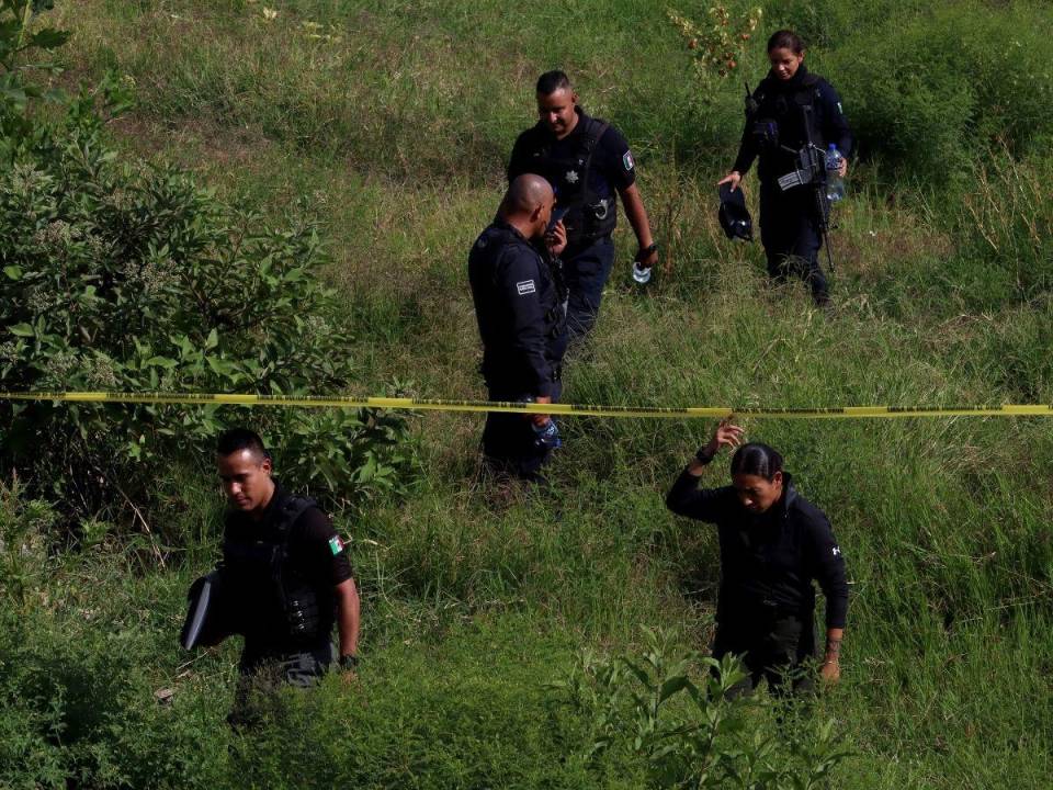 Municipal police work at the area where the civil organization “Search Mothers” of Jalisco located a clandestine crematorium with human remains in a ravine in Tlaquepaque, State of Jalisco, Mexico, on October 15, 2023.